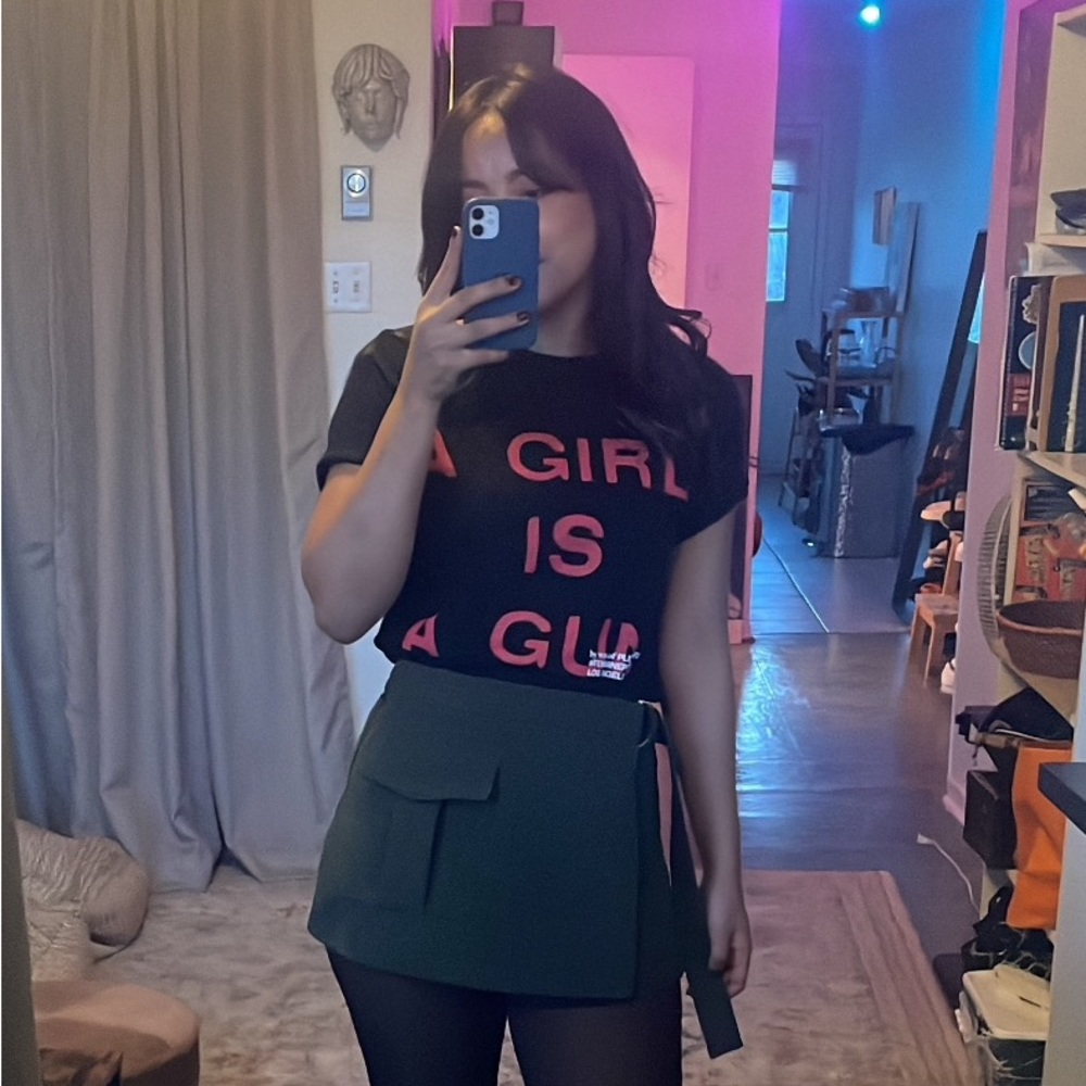 PLEASURES a girl is a gun t-shirt size Small